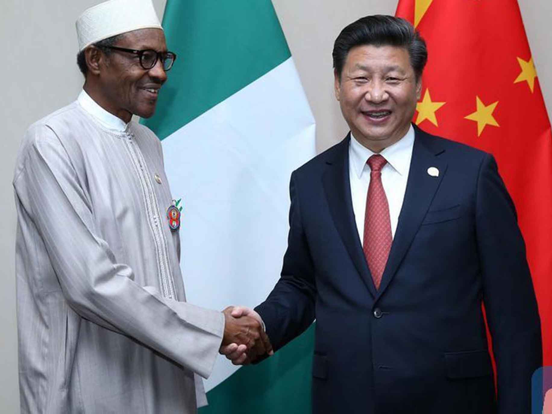 Buhari and China president, Xi - the Chinese are buying Africa